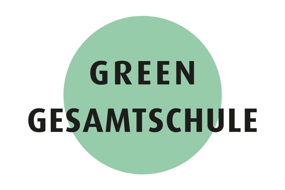 Grüner Kreis mit schwarzen Schriftzug Gesamtschule Körnerplatz