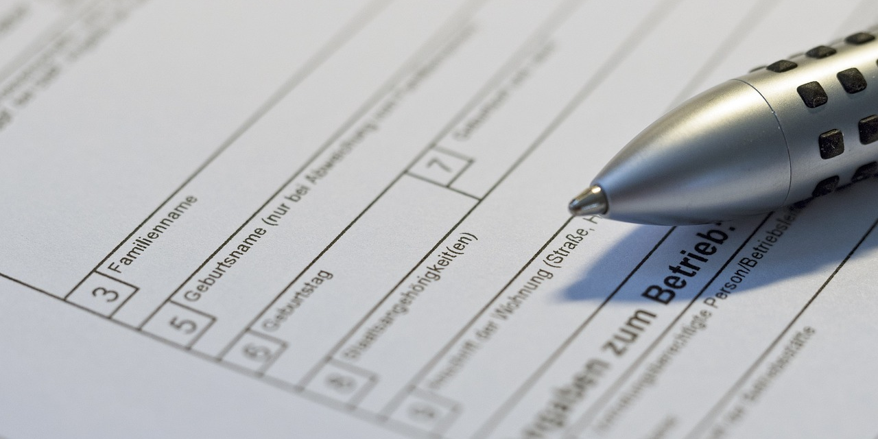 Formular mit Kugelschreiber