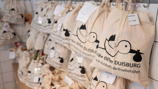 Frühe Hilfen - Beutel mit Babykleidung