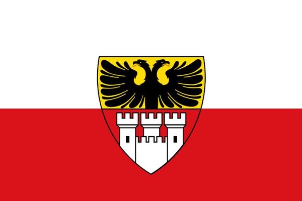 Das Wappen von Duisburg, Schwarzer Doppeladler über Burg mit 3 Türmen