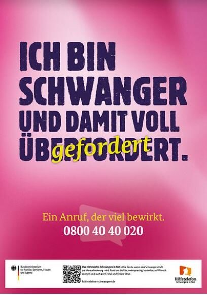 Plakat mit der Aufschrift "Ich bin schwanger und damit voll überfordert