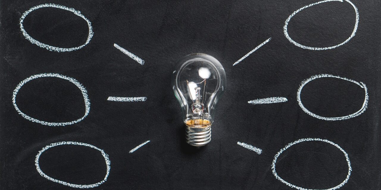 Glühbirne mit Kreisen an den Seiten