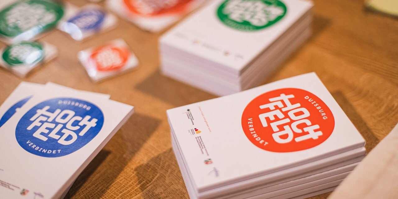 Verschiedene Werbeartikel mit Hochfeld Logo